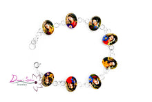 Load image into Gallery viewer, Pulsera ovalada con la virgen de Guadalupe adornado con flores